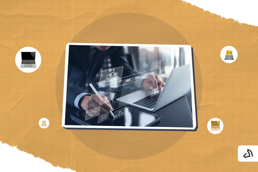 A person is using their laptop, while tapping some holographic images