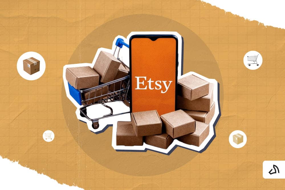 A phone with the Etsy sign surrounded by tiny toy boxes on the ground and in the shopping cart