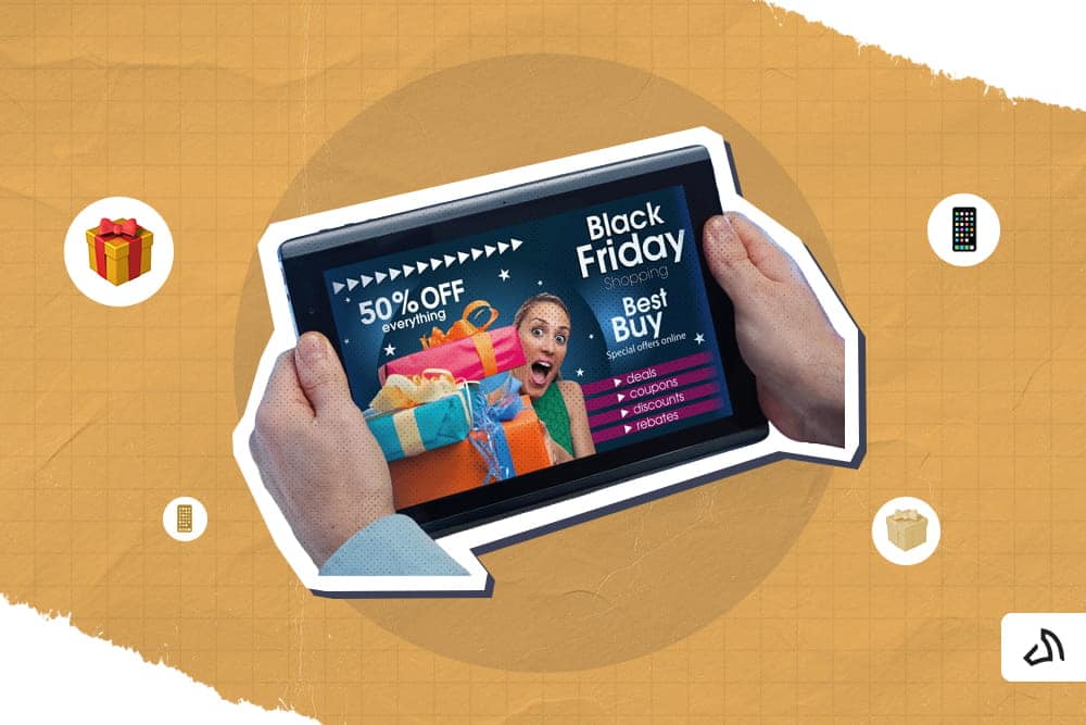 Une paire de mains tient une tablette avec une vente du Vendredi fou à l’écran