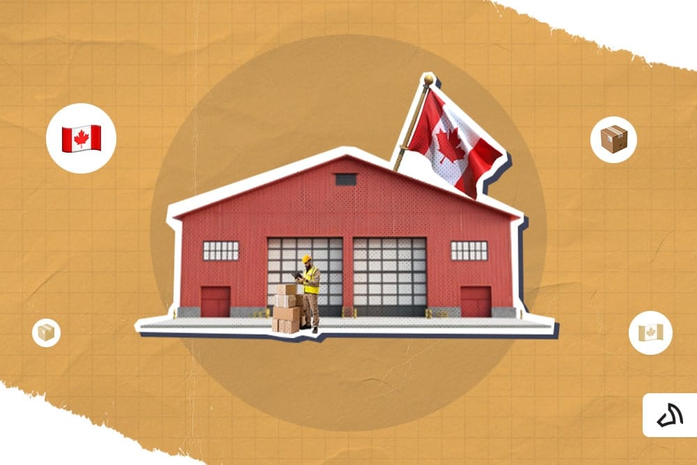 A red shipping warehouse with a man and a stack of boxes standing in front.