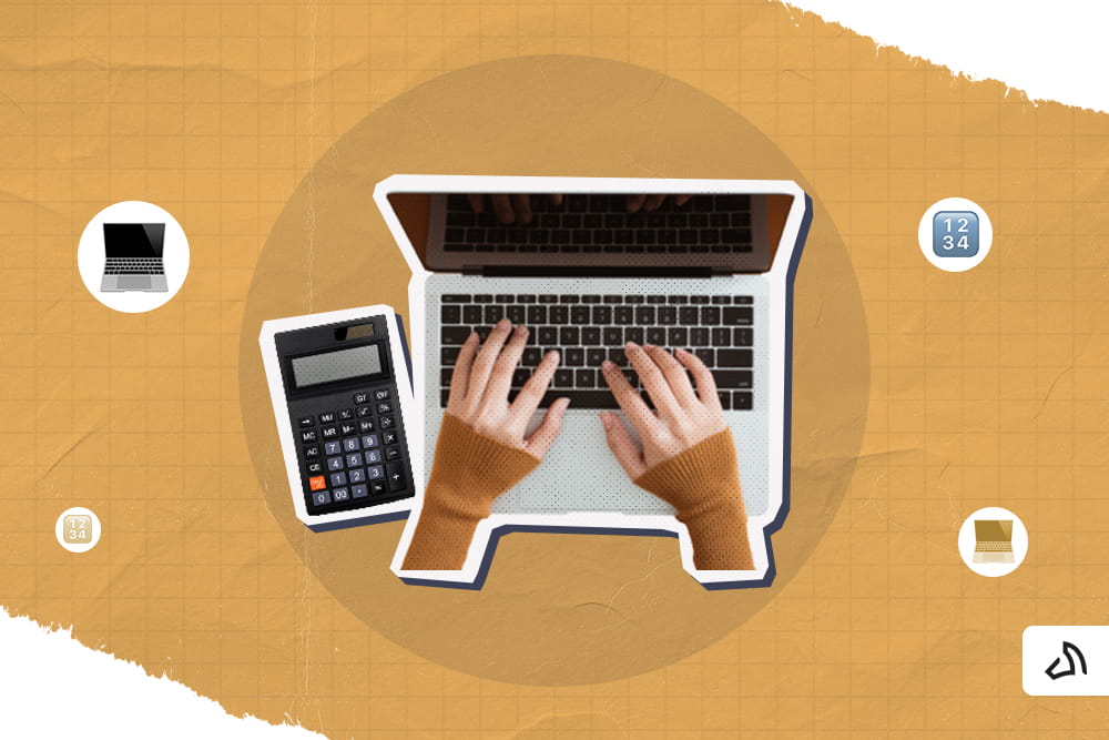 A person using the laptop with a calculator beside it